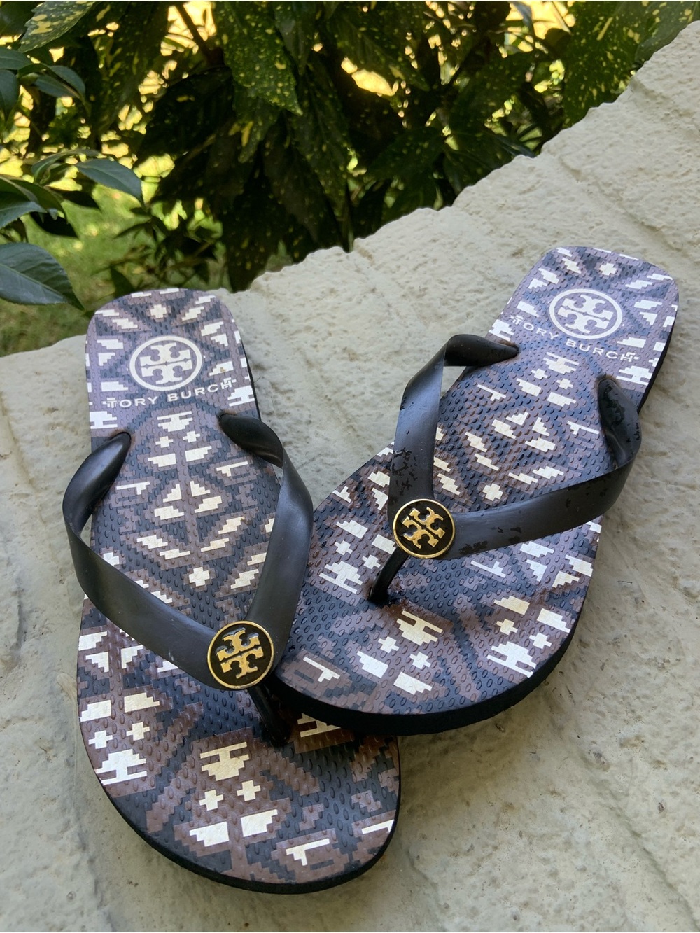 Tory Burch Black Strappy Flip Flops with Brown Patterned Footbed